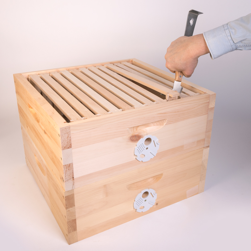 Rozperák obojstranný s hákom a drevenou rukoväťou, nerez